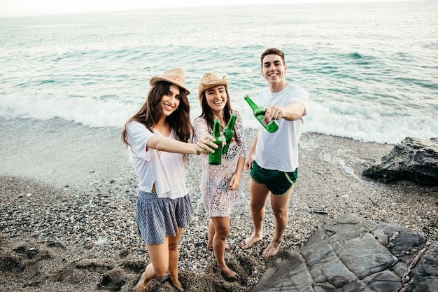 friends-beach-with-beer_23-2147827118